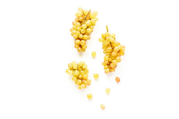 Many fresh green grape clusters isolated on white background.