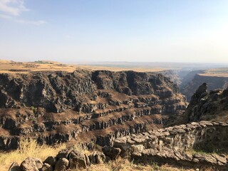 Very wide canyon in daylight against blue sky in Armenia. high quality photo