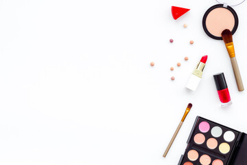 Makeup tools and cosmetics products, top view