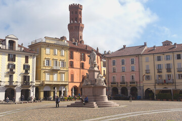 Fototapeta premium Piazza Cavour is the most important square in Vercelli. It is famous for the statue dedicated to Cavour, the trompe l'oeil of its ancient buildings, and the stone floor.