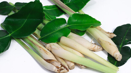 Fresh Herbs for Culinary Delights: A vibrant assortment of lemongrass stalks and kaffir lime...