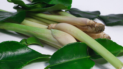 Aromatic Lemongrass and Kaffir Lime: A fresh bundle of lemongrass stalks and vibrant kaffir lime...