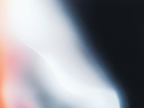 Light leak effect with grain and blue, black, and orange gradient. Abstract bokeh background for overlay and backdrop.