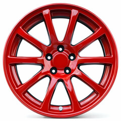 Obraz premium A vibrant red car wheel showcasing sleek design, perfect for automotive enthusiasts and promotional materials.