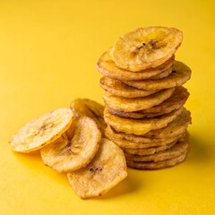 Stacked Fried Plantain Chips on Yellow Background – Crispy Tropical Snack Food Concept.