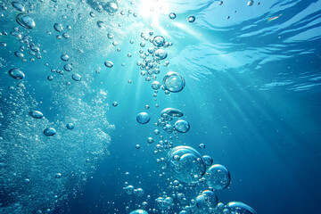 Close-up image of underwater bubbles rising through clear water, shimmering surface
