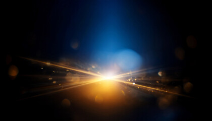 flare light blur optical leak defocused blue yellow golden color lens sparkle texture on abstract dark black background