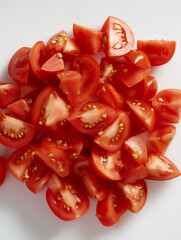 Chopped Red Tomatoes on White Background