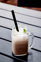 Delicious milkshakes are on the table.