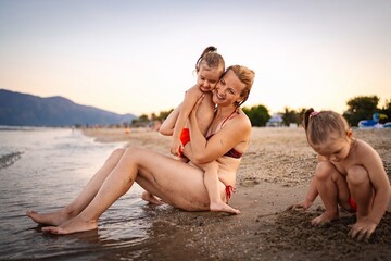 Fototapeta premium Enjoying a joyful summer evening at a Greek beach