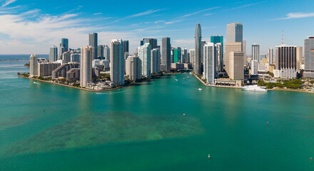 Miami from Brickell Key in Florida. Skyscraper in downtown city. Cityscape skyline. Brickell building in Miami downtown. Brickell skyline with skyscraper architecture. City skyline