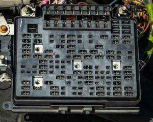 A fuse block in a wrecked truck