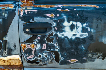 A door of a wrecked truck