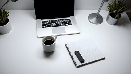 Clean and minimalist desk setup with laptop, coffee, and notebook for productivity.