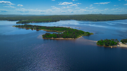 Aerial view of a large lake in the Canadian forest in Quebec in the Lanaudière region