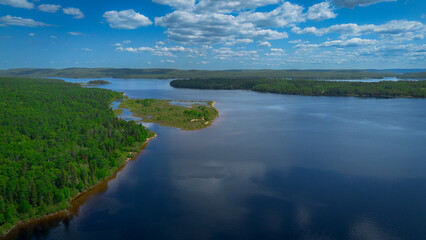 Aerial view of a large lake in the Canadian forest in Quebec in the Lanaudière region