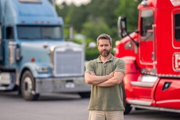 Trucking owner. Truck driver. Man trucker driver near lorry truck. Transportation vehicles. Semi trucks vehicle. Hispanic man trucker. Handsome man driver in front of truck. Copy space