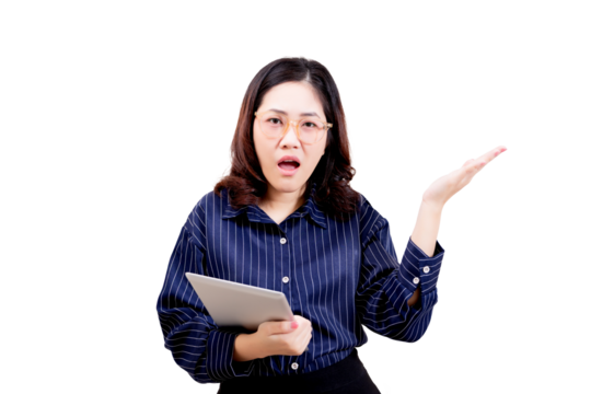 Asian young beautiful, surprised woman wearing glasses and a striped shirt holds a tablet while gesturing with her other hand raised.