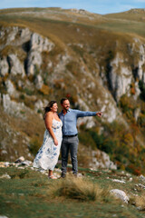 Romantic couple embracing outdoors in nature