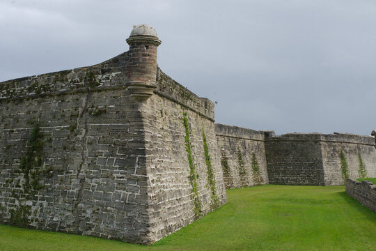 Historic Castillo de San Marcos Fort Editorial Use Only June 6, 2025  St. Augustine, Florida, USA. Stone Fort with Tower Against Overcast Sky. Ancient stone fort structure featuring a prominent tower 