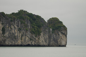 Limestone cliff in Lan Ha Bay. Cat Ba Archipelago. Vietnam.