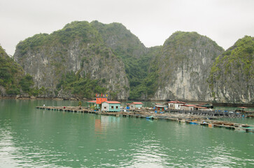 Floating fishing village. Lan Ha Bay. Cat Ba Archipelago. Vietnam.