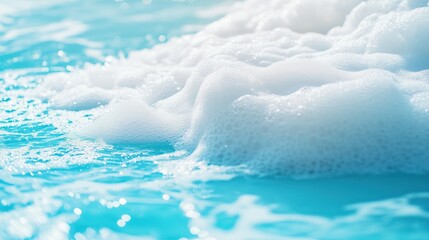 Close-up of soothing watercolor waves with soft foam on tranquil blue water.