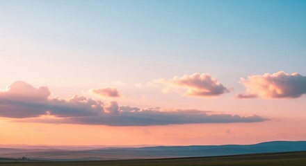Pastel Sunset Over Rolling Hills