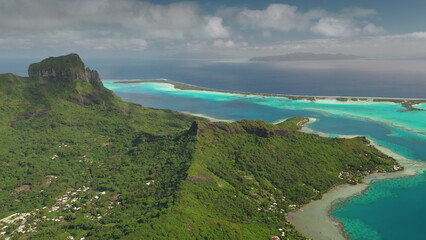 Breathtaking beauty of Bora Bora tropical island, green mountain vegetation, vibrant turquoise...