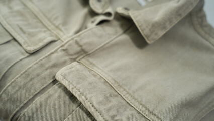 Khaki Green Utility Shirt with Flap Pockets – Close-up Fabric Texture