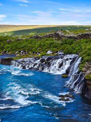 Majestic Barnafoss and Hraunfossar waterfalls in Icelands stunning landscape