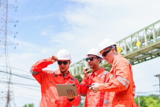 Engineer teams are inspecting and working together in oil and gas refinery facility.