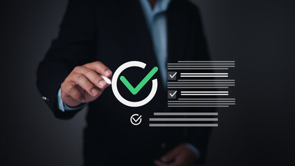 Person marks a holographic checklist with checkmark, symbolizing task completion, project success,...