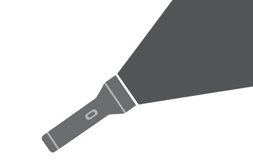 Spotlight focuses on the tip of a flashlight during an exploration in a dark setting at night