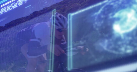 Pedaling cyclist wearing helmet and suit on road bike on hillside road, with digital display