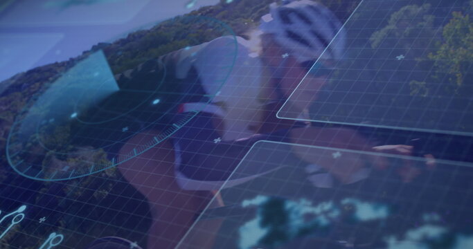 Riding female cyclist wearing cycling gear through forest road on road bike, with HUD overlays