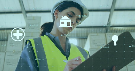 Warehouse inspector in safety helmet, neon vest checking inventory on clipboard, with digital icons