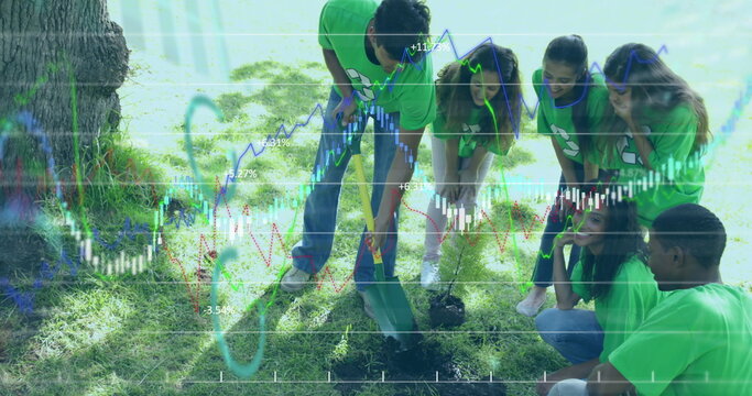 Digging volunteers wearing bright green T-shirts working in park, with shovel, hole and data charts - Powered by Adobe