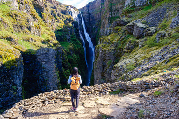 Witness the majestic Glymur Waterfall cascading down cliffs in Icelands stunning landscapes © Fokke Baarssen