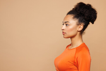 Close up young strong fitness trainer instructor sporty woman sportswoman she wear orange clothes...