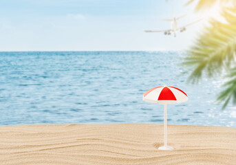 Summer relax frame. Sunny beach with sun lounger, sun umbrella, plane flying away and palm trees...