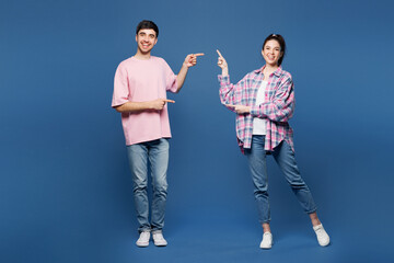 Full body young smiling couple two friends family man woman they wear pink casual clothes together...