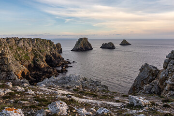 Dusk light on the Tas de Pois sea stacks, seen from Pen Hir Point in Camaret-sur-Mer, Brittany, France