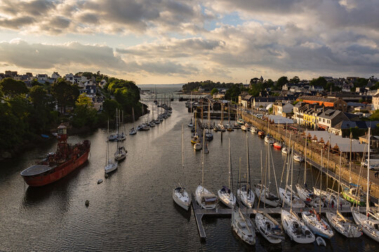 &ldquo;Sunset over Port‑Rhu marina in Douarnenez, Brittany, with traditional boats and Port‑Mus&eacute;e in view&rdquo;