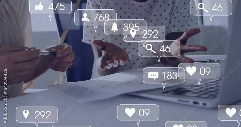Poster marketing colleagues pointing at reports showing social icons rising shrinking refining metrics