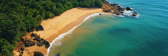 Tranquil tropical beach cove from above. Lush foliage meets a golden sandy shore, lapped by turquoise waves