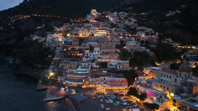 Drone view of Positano at night on Amalfi Coast, Italy