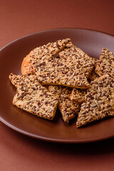 Crispbread, thin bread with seeds and grains, a baked cracker. Crispbread with sesame seeds