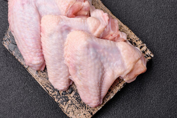 Raw chicken wings, fresh uncooked poultry meat. Chicken or turkey wings