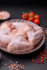 Raw chicken wings, fresh uncooked poultry meat. Chicken or turkey wings